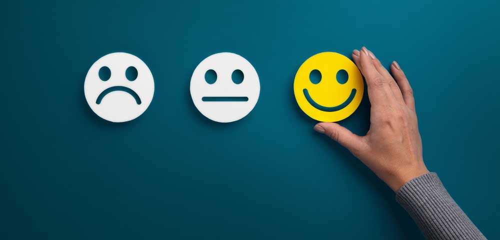 Foto mit Smileys mit traurigem und lachendem Gesicht